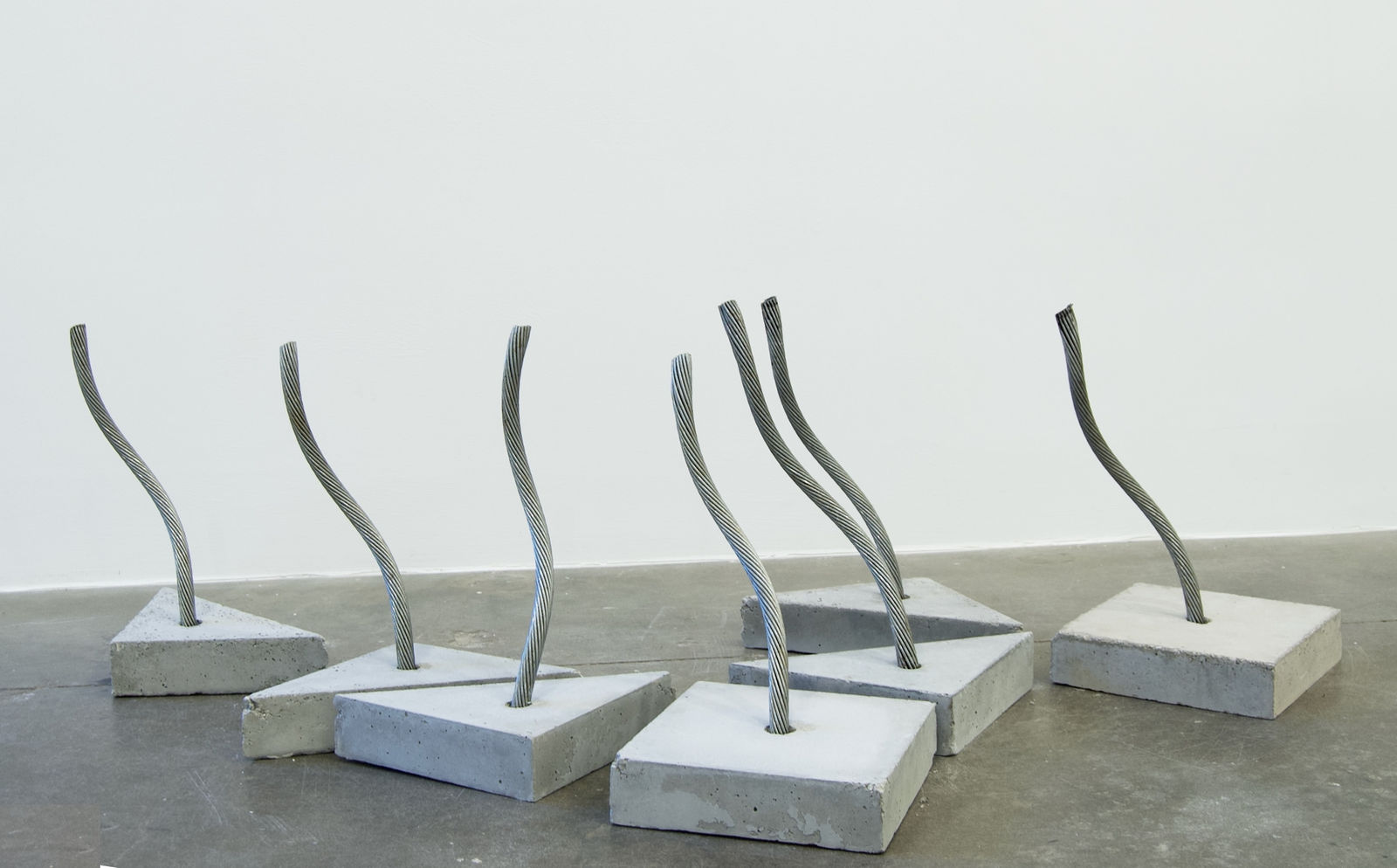 Various shaped cement slabs with metal wire inserted