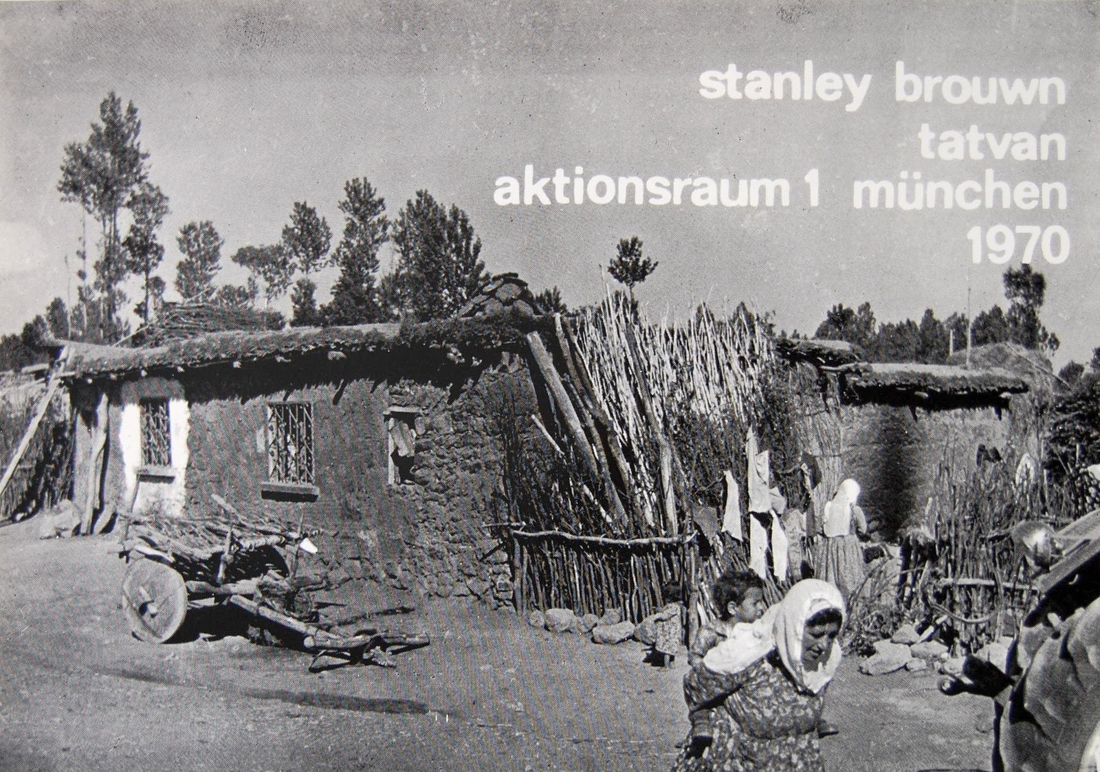 Poster from Aktionsraum 1, rural scene with thatched roof home and woman carrying child on back