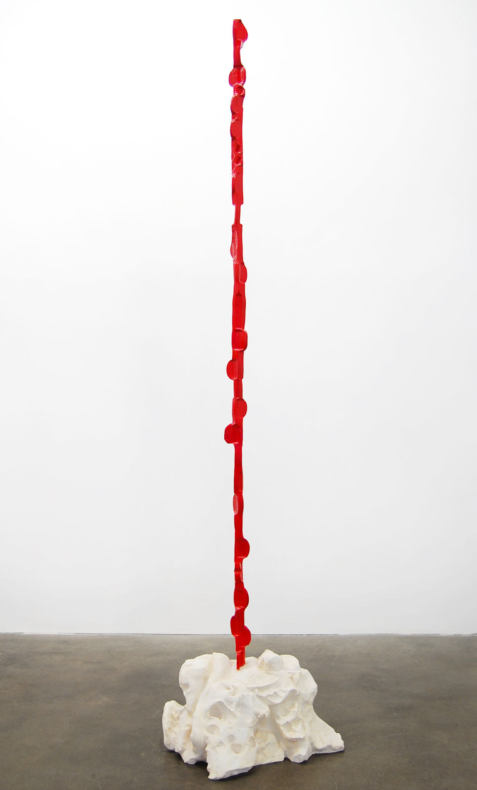 A tall vertical sculpture
