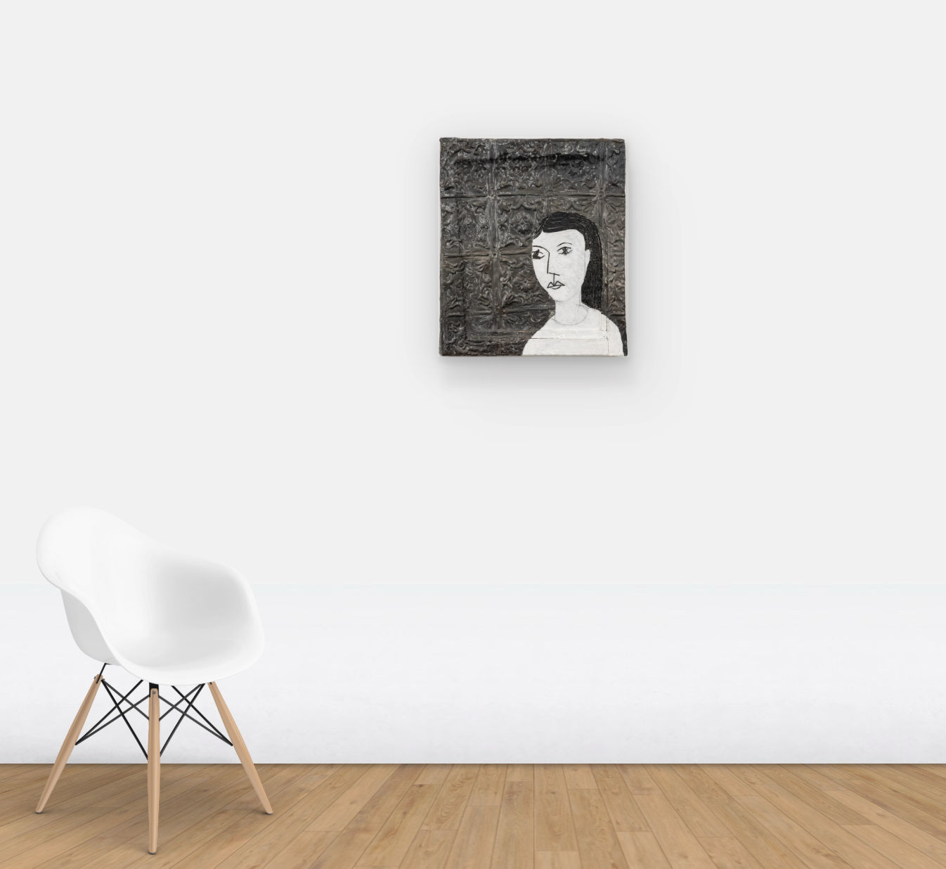 Wall view of painting of a young girl in front of tin wallpaper with a floral motif