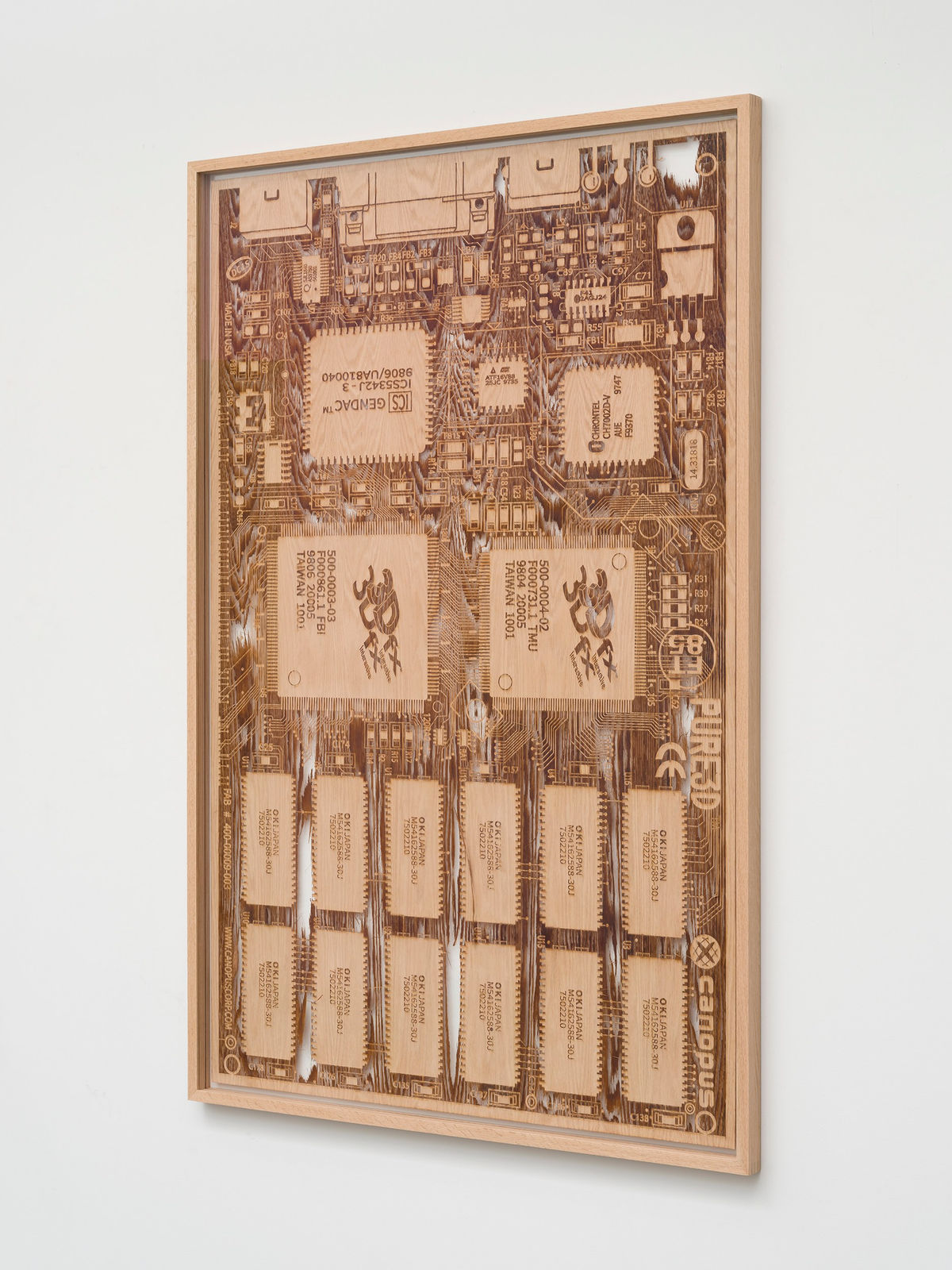 a laser sculpted wood sculpture on a white wall