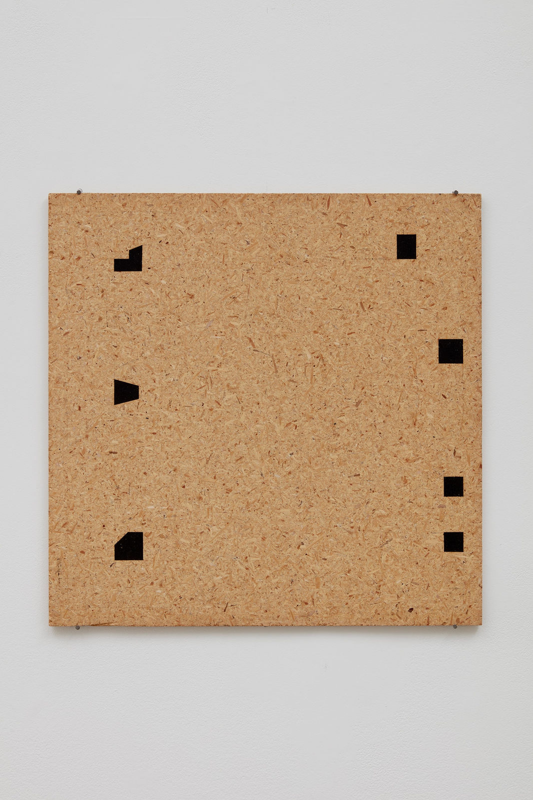 Image of Particle Board with Black Shapes #3.