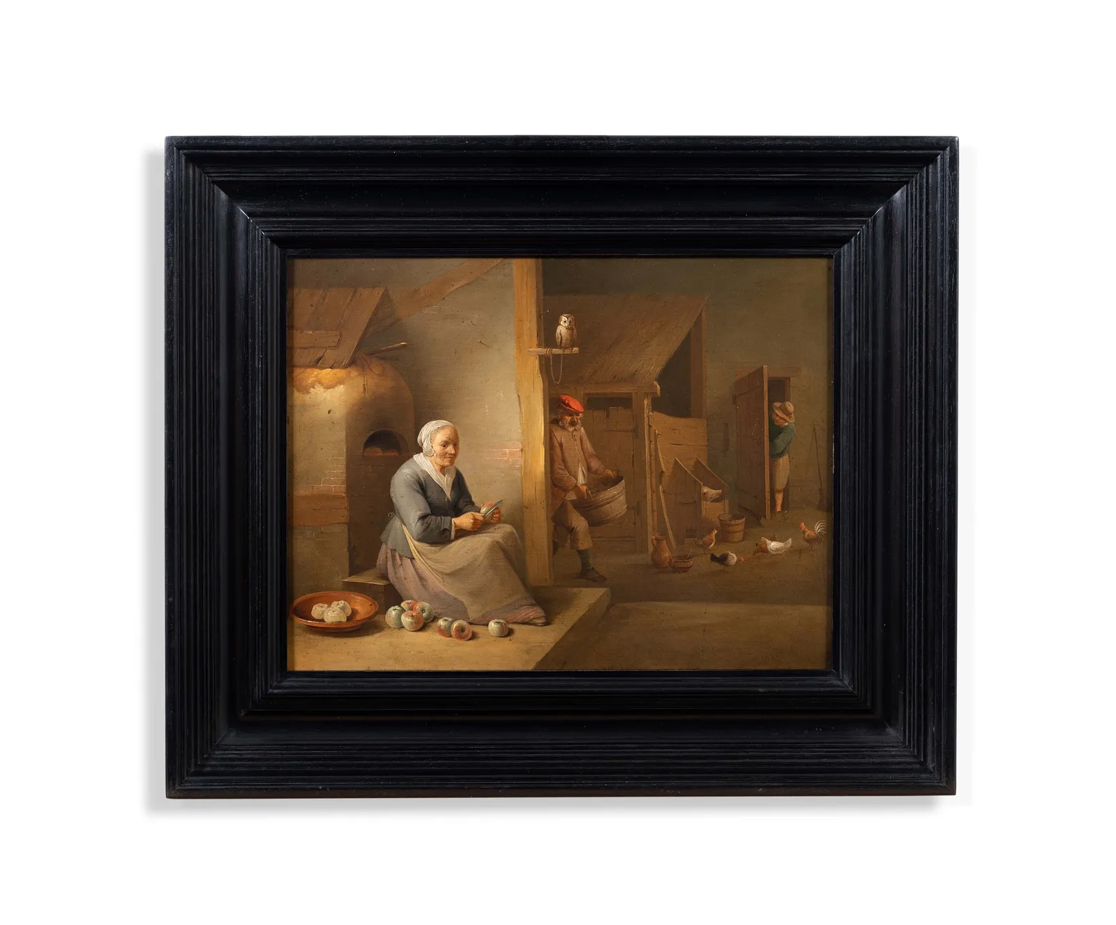 Circle of David Teniers the Younger, An interior with an old woman peeling apples