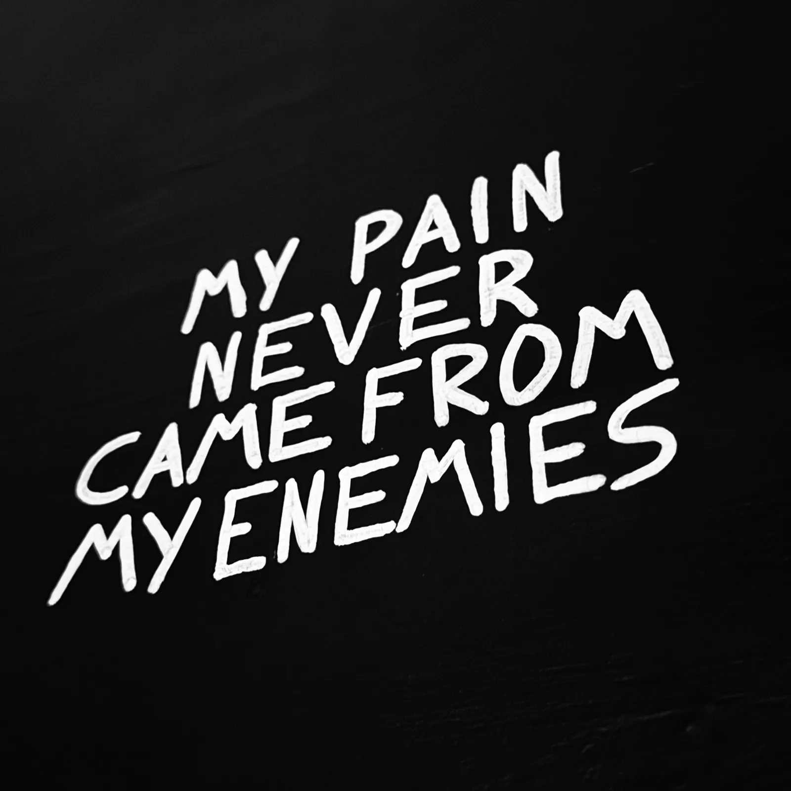 A close-up detail of the painting focusing on the bold, expressive white lettering and the tactile, weathered texture of the joint compound and acrylic layers.