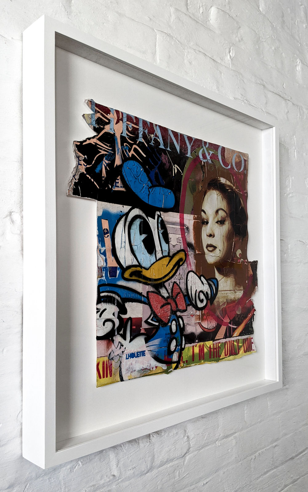 lhouette artist using collage acrylic diamond dust featuring Disney characters like Donald duck with orange blue white red brown colours