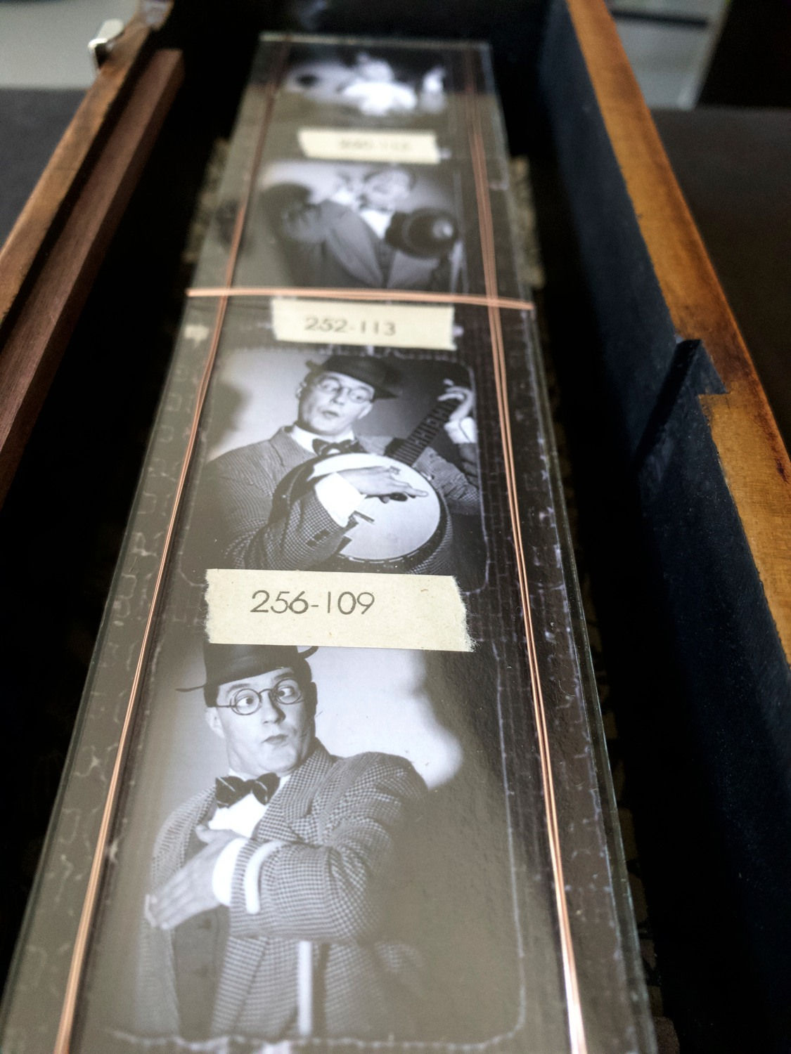 Vintage storybox with photographs of man playing guitar