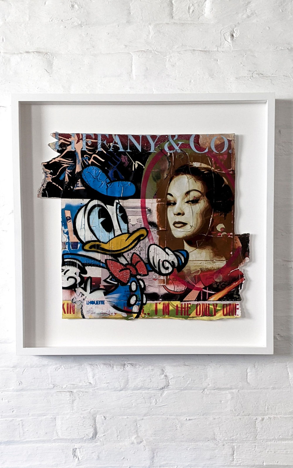 lhouette artist using collage acrylic diamond dust featuring Disney characters like Donald duck with orange blue white red brown colours