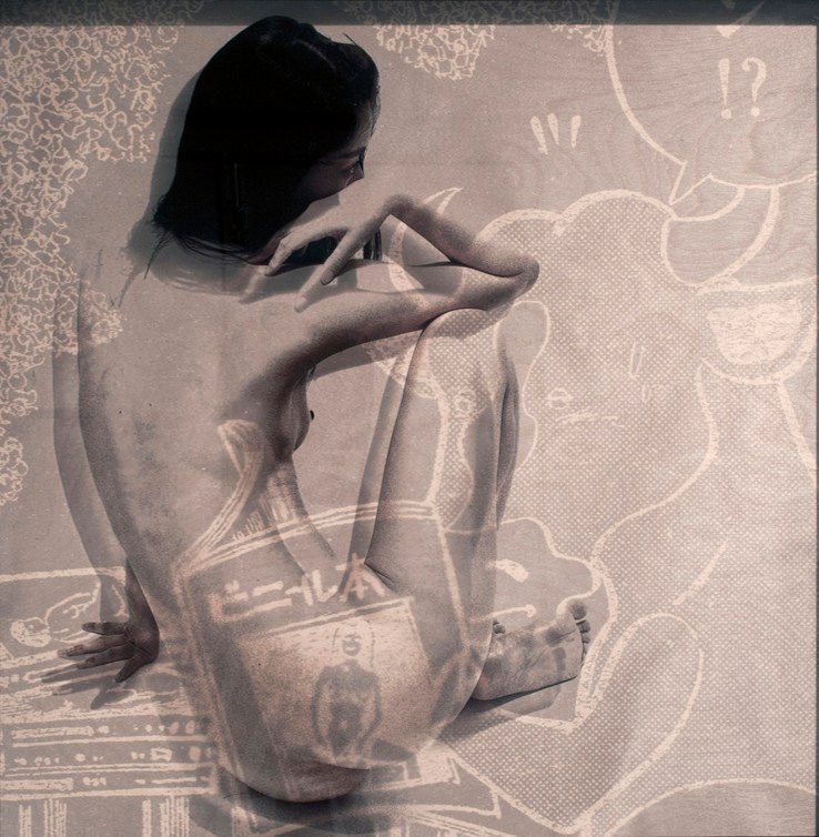 Woman sitting with arm on knee Japanese imagery in the background