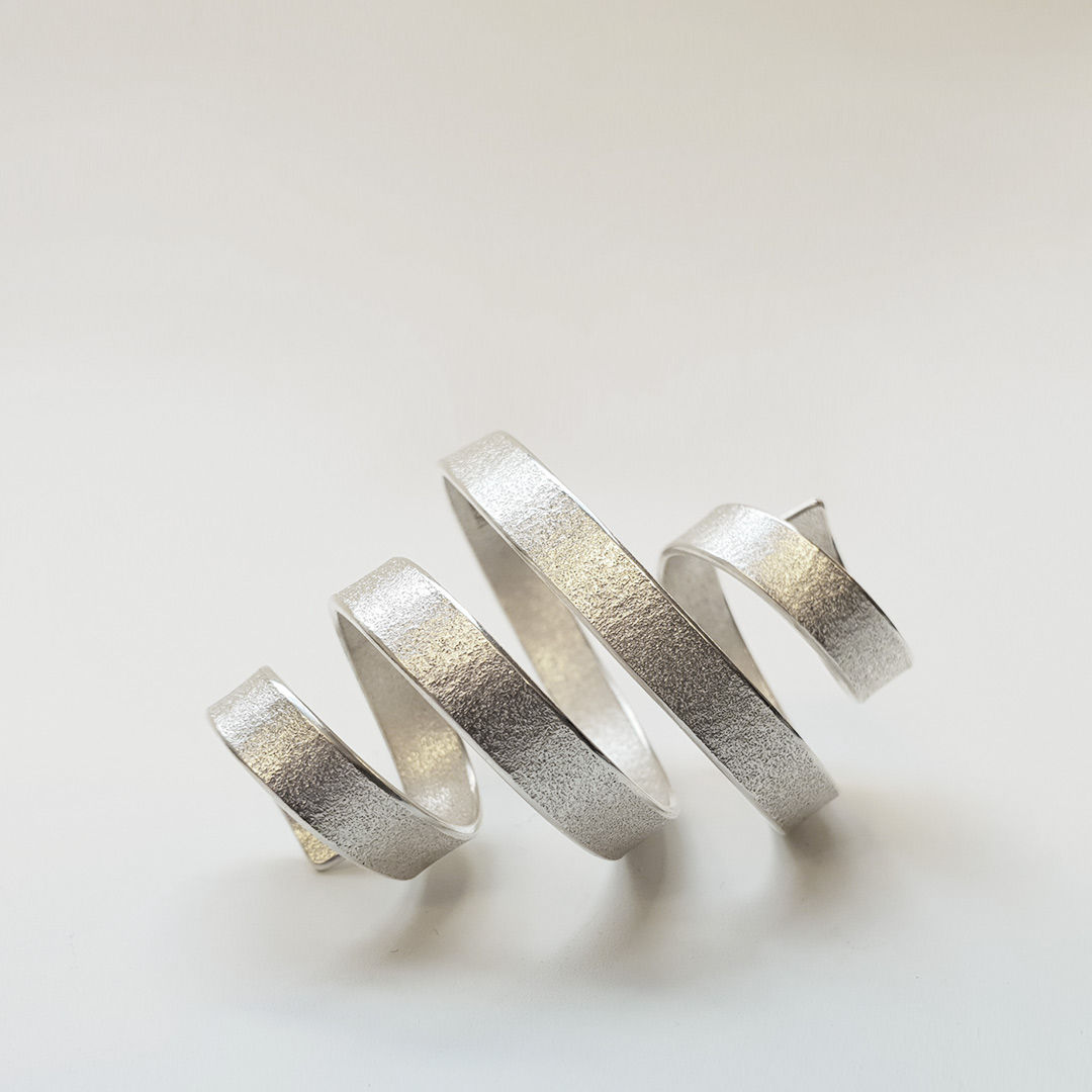 Contemporary art jewelry - spiral ring #2 in 100% recycled silver by jewelry artist Ute Decker