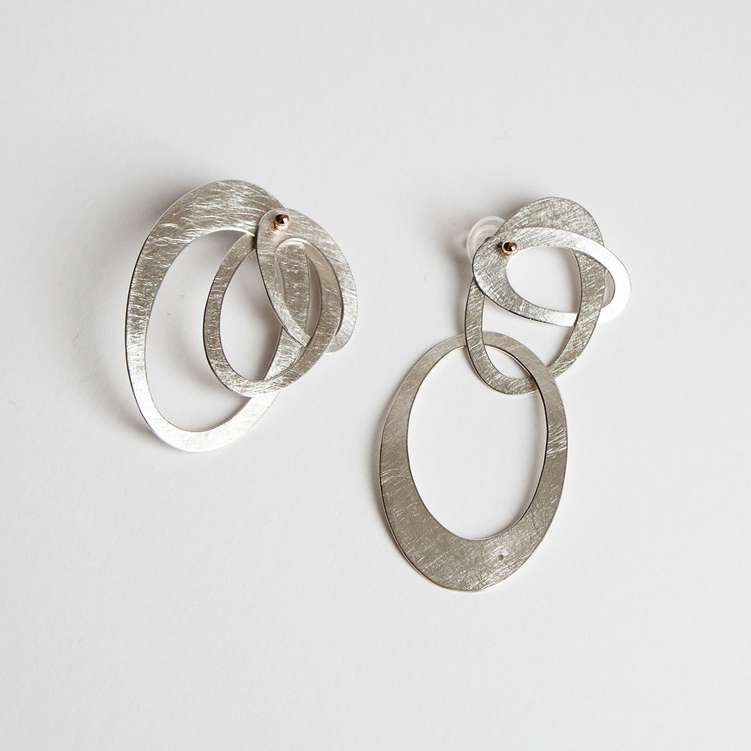 sculptural earrings by Ute Decker, jewellery artist exhibiting at Goldsmiths' Fair 2022