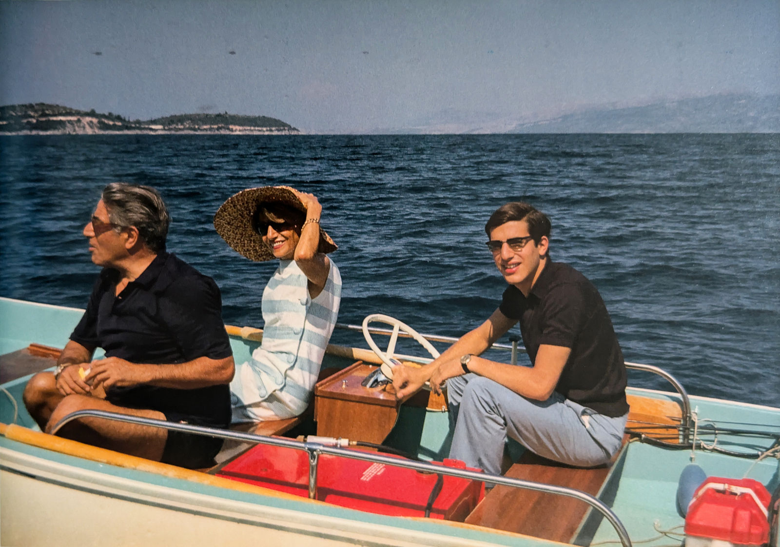 Marianne Sayn-Wittgenstein-Sayn, Aristotle Onassis, his sister, and his son Alexander cruise on the S.Y. "Tritona" along the Dalmation coast, Skorpios Island, Greece, September, 1966