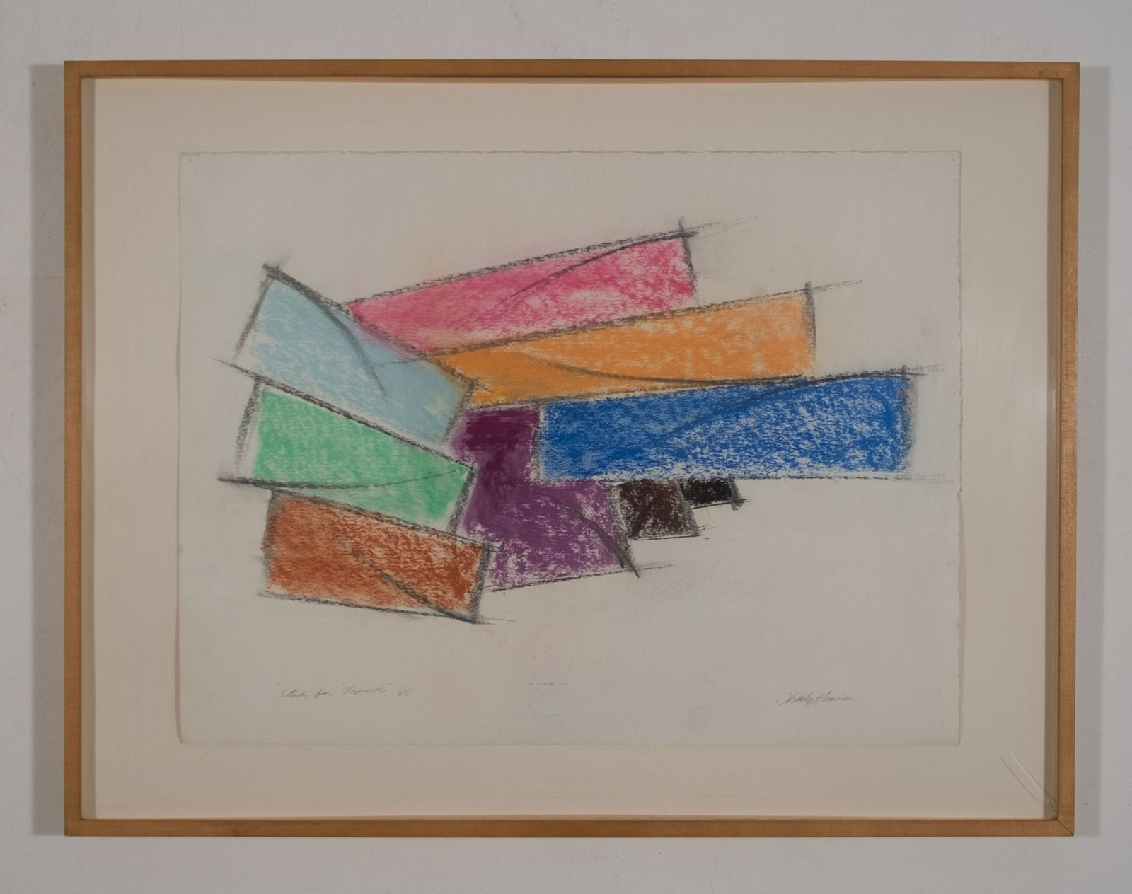 Color drawing of interconnected tridimensional rectangles in light blue, green,brown, pink, orange, blue, purple, and black