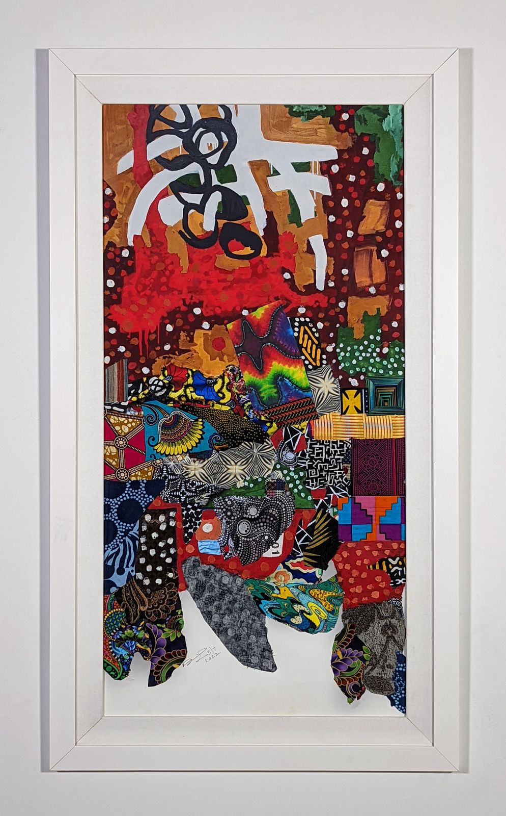 White framed colorful artwork comprised of oil and patterned fabric on print in a 