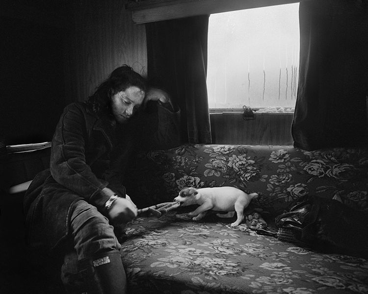 Chris Killip, Alice and the little dog, Lynemouth, Northumberland, 1983