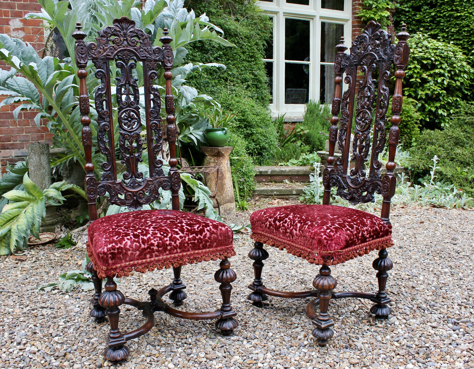 Pair of baroque early 18th century walnut side chairs , Circa 1700