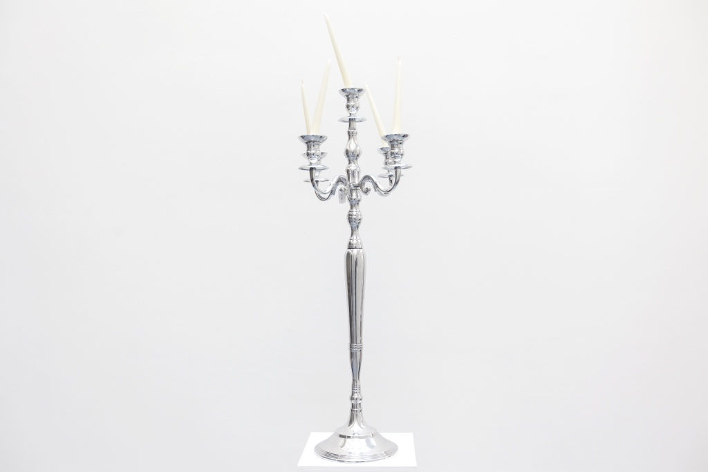Hans-Peter Feldmann, Candles holder with crossed candles