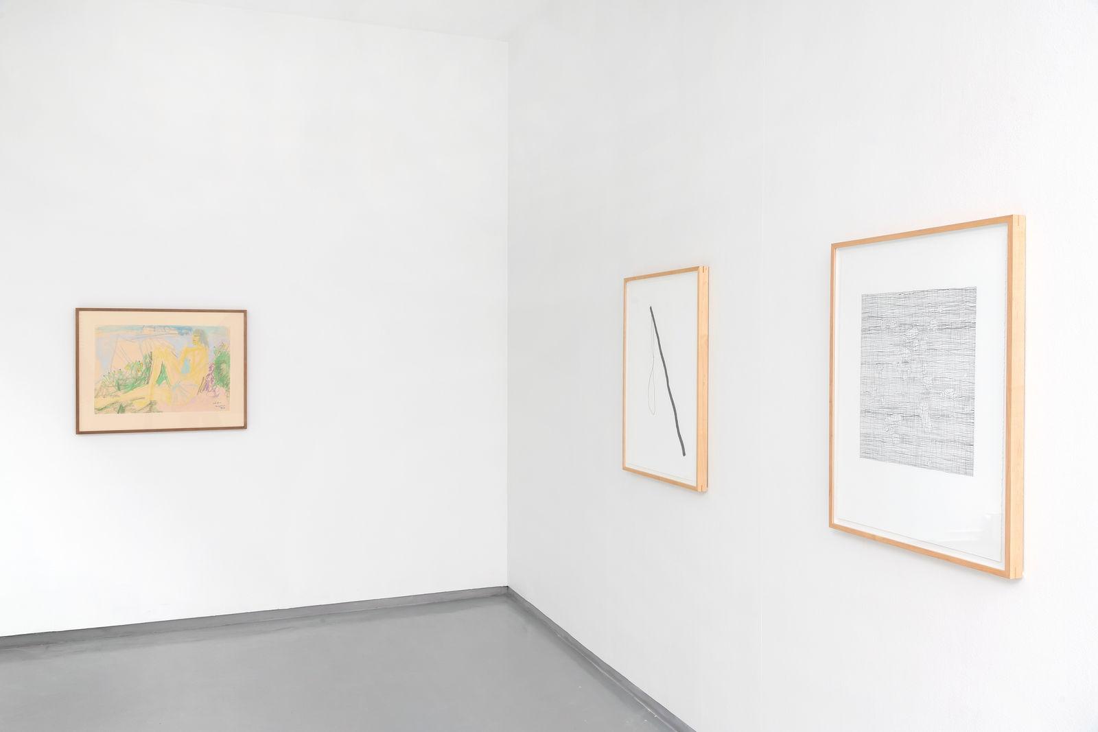 Two framed graphite line drawings by Inger Johanne Grytting hang on a white wall in a gallery like space in Oslo, Norway