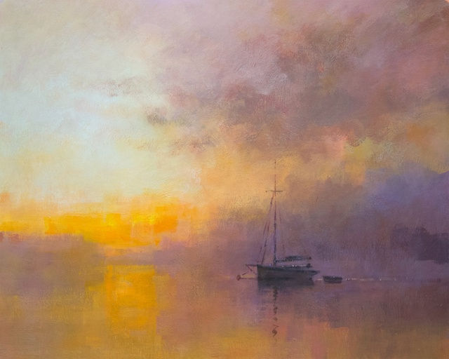 Sail boat anchored sunset in background