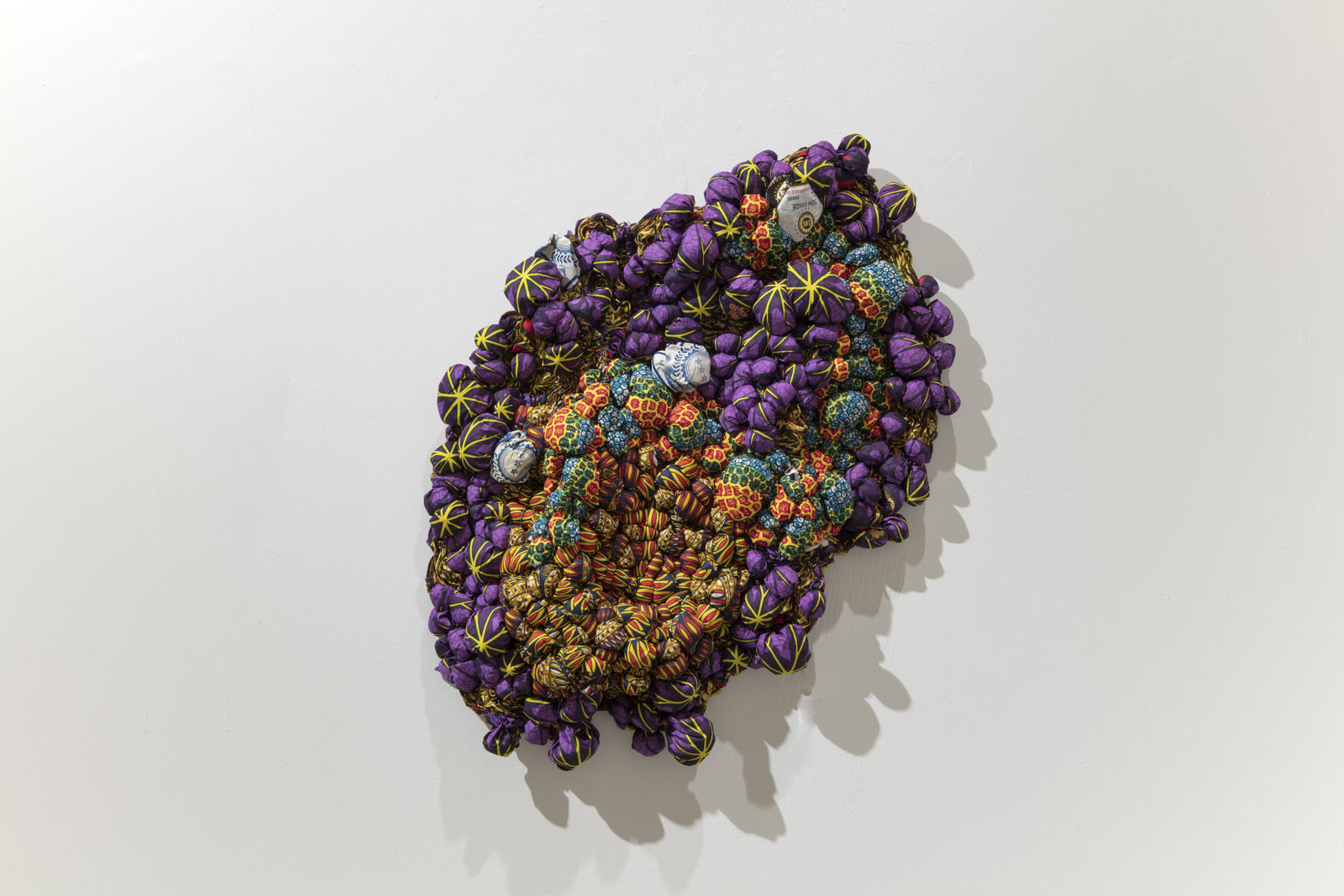 Samuel Nnorom, Untitled, 2025, African Wax Print Fabric, 117 × 91 × 14 cm