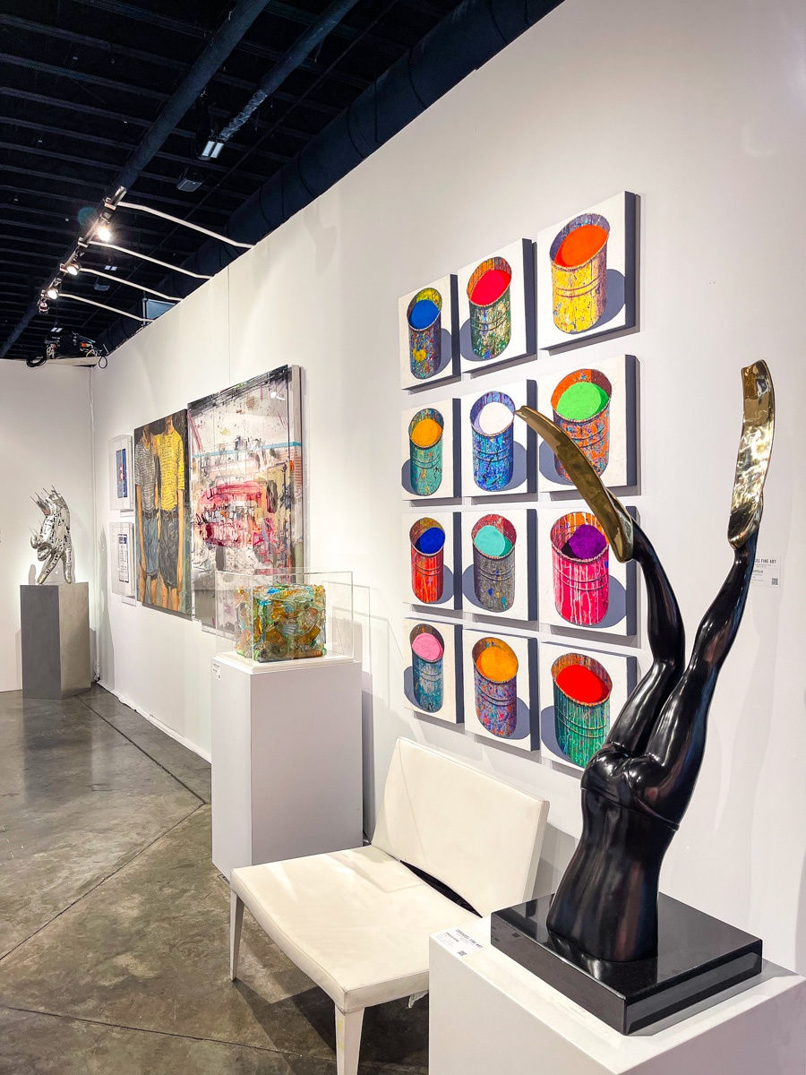 Paintings and sculptures displayed at Carousel Fine Art's booth at the Palm Beach Show art fair, 2022.