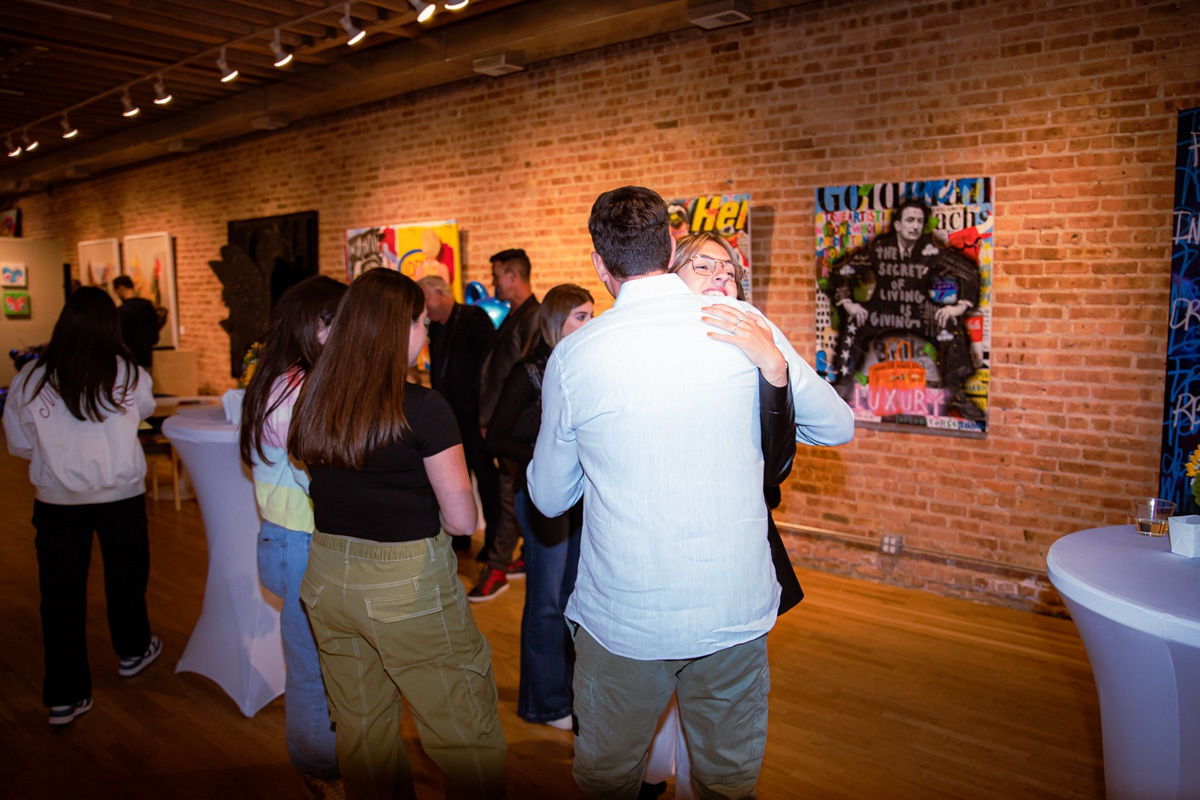 People in Carousel Fine Art's Chicago gallery space.