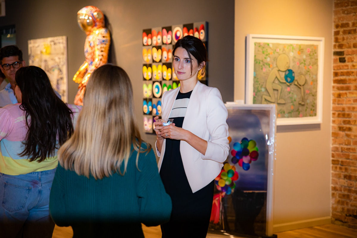 People in Carousel Fine Art's Chicago gallery space.