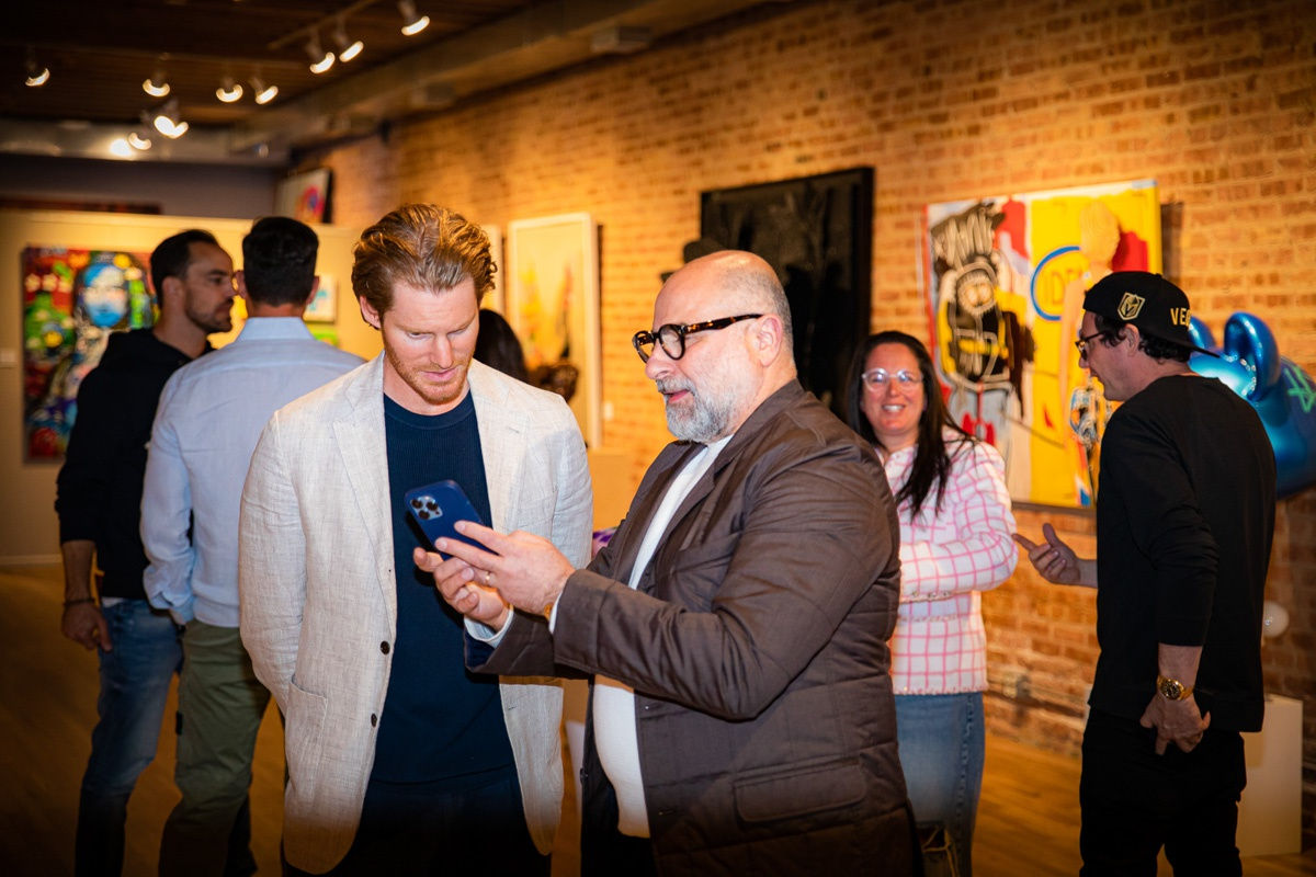 People in Carousel Fine Art's Chicago gallery space.