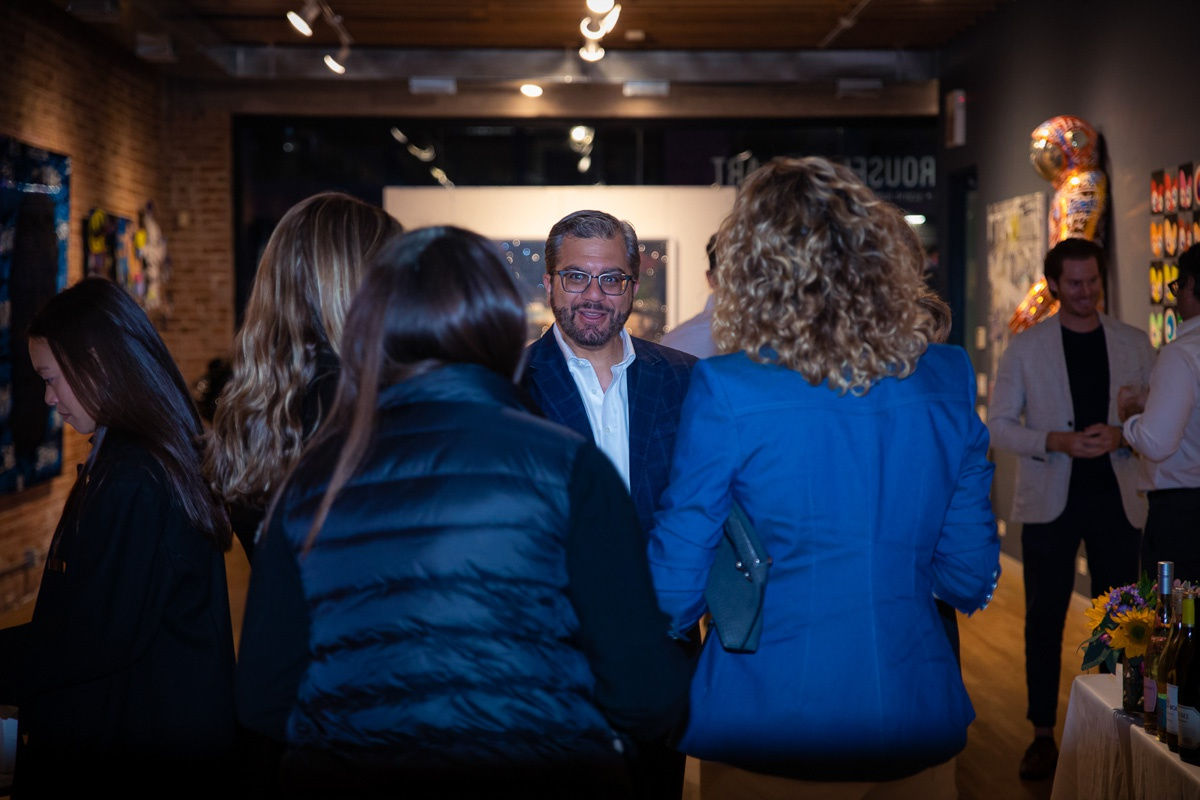 People in Carousel Fine Art's Chicago gallery space.