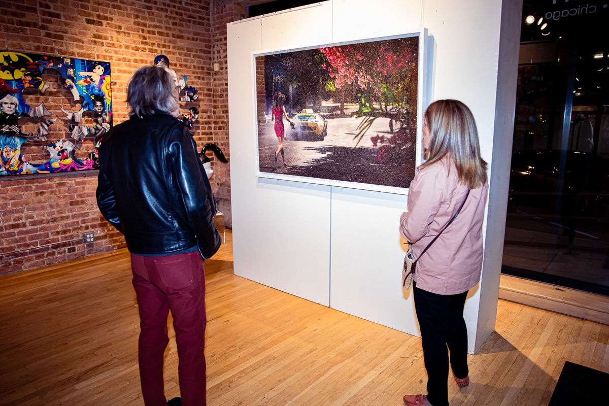 People in Carousel Fine Art's Chicago gallery space.