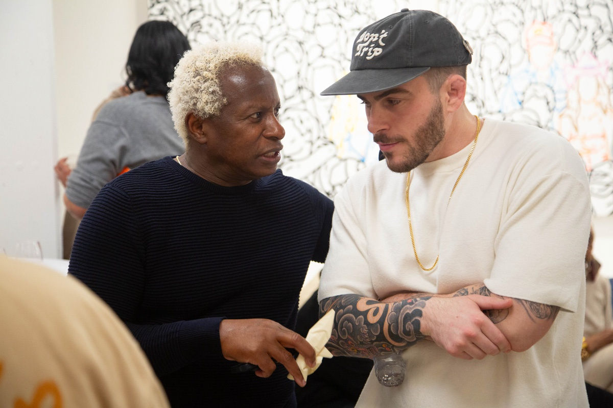 People in Carousel Fine Art's Atlanta gallery space during the spotlight exhibition for John Westbay titled "Love, Outside the Lines."
