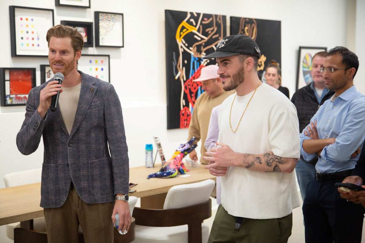 People in Carousel Fine Art's Atlanta gallery space during the spotlight exhibition for John Westbay titled "Love, Outside the Lines."
