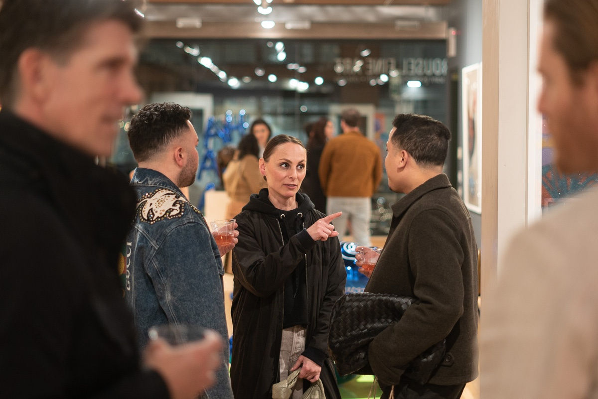 People in Carousel Fine Art's Chicago location during the Chicago Grand Opening.