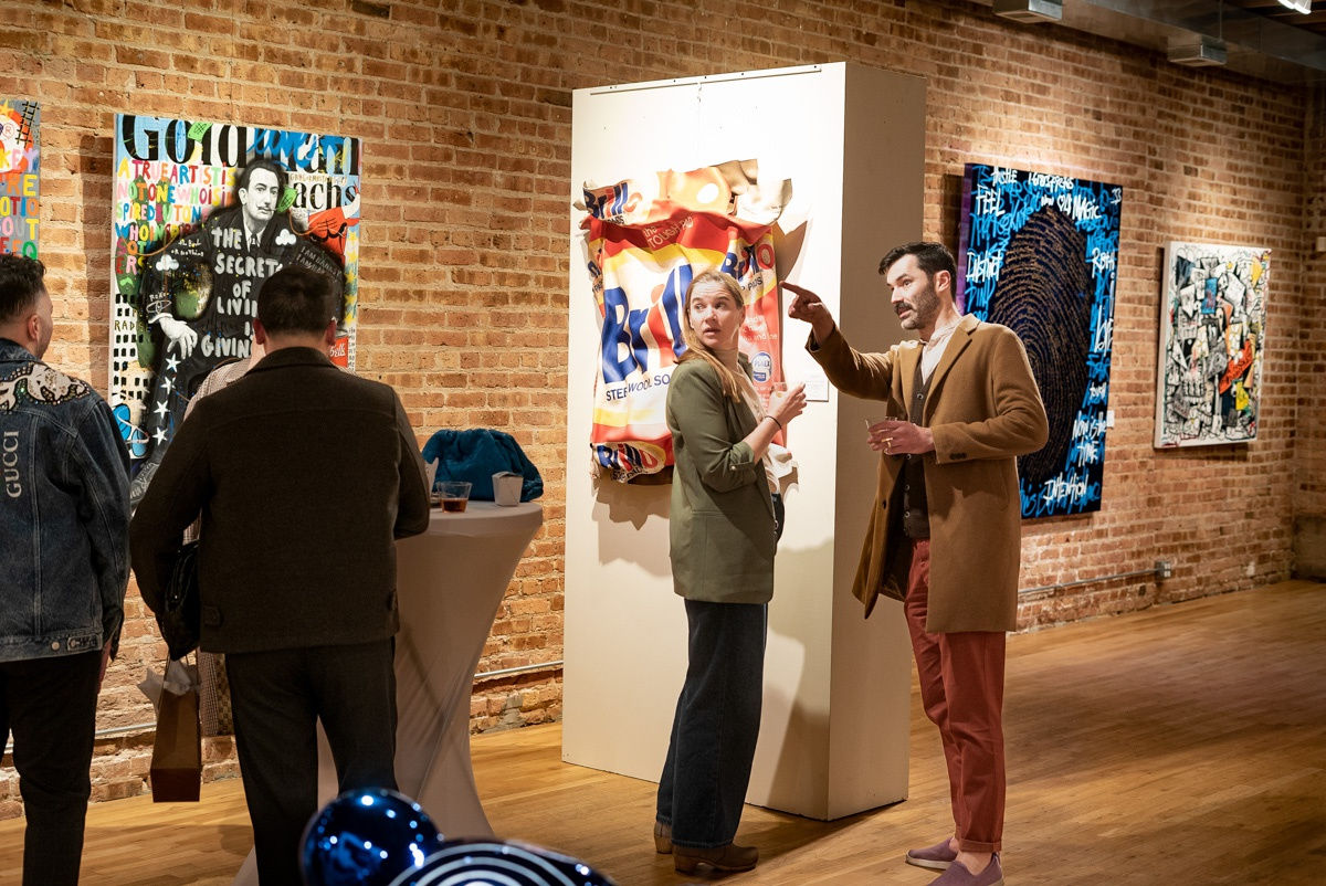 People in Carousel Fine Art's Chicago location during the Chicago Grand Opening.