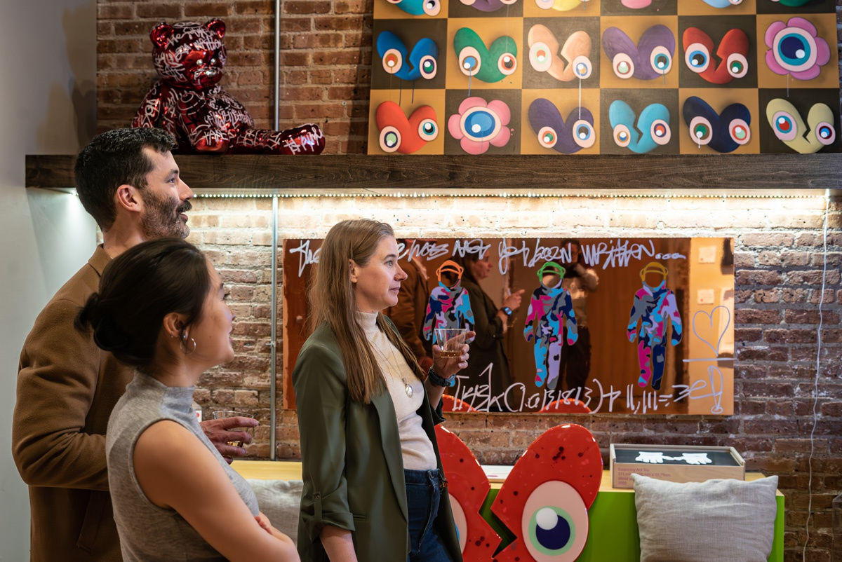 People in Carousel Fine Art's Chicago location during the Chicago Grand Opening.