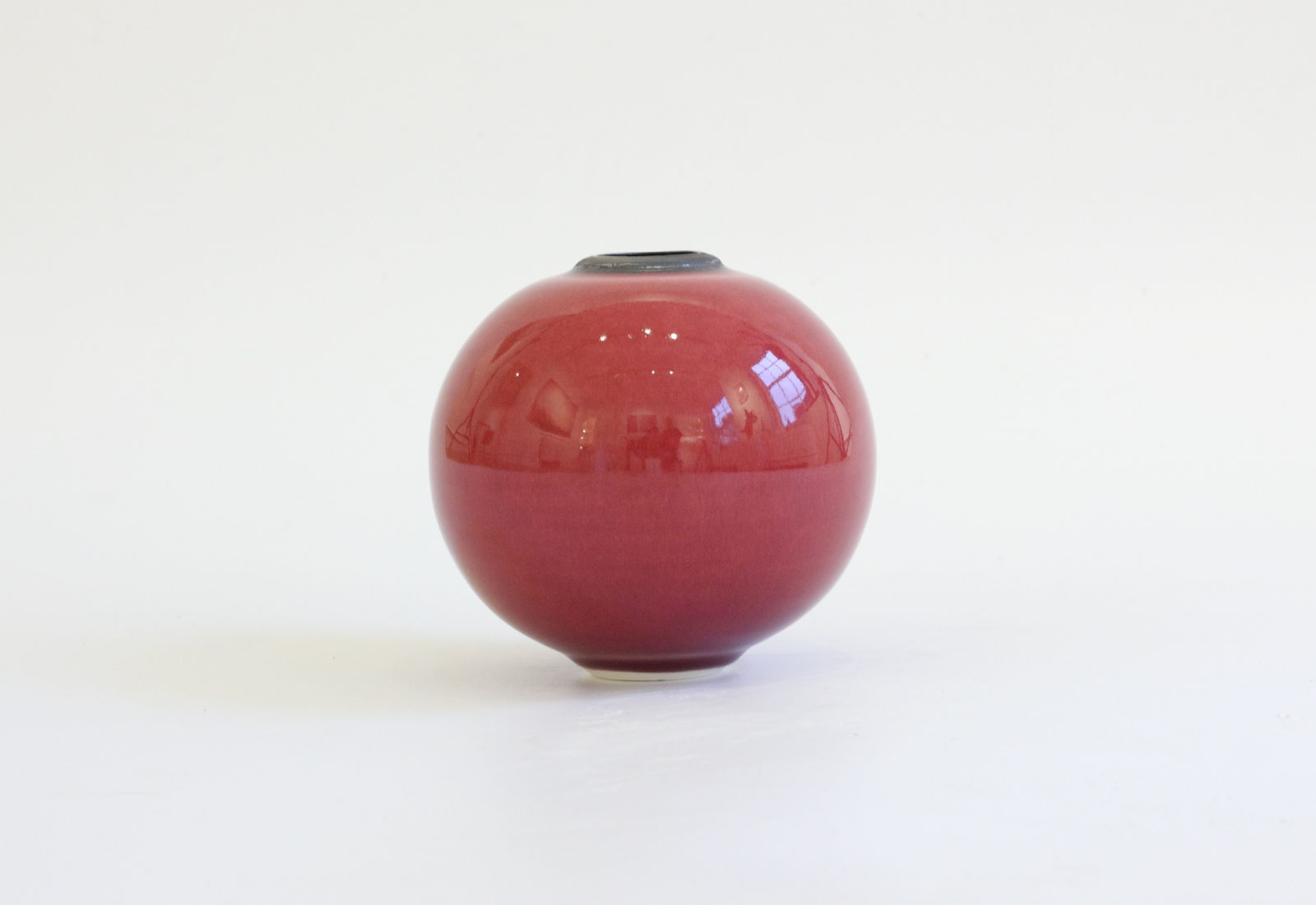 Tricia Thom, 65. Mini moon jar copper red