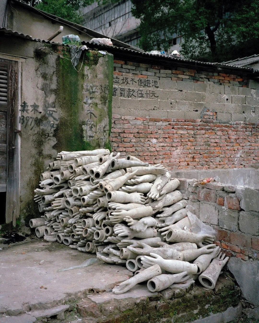 This work is part of The Future In Small Doses: a series of photographs taken by the artist while he was traveling in southern China. Through noticing then capturing objects, places and forms around him that he isn’t accustomed to, the work highlights cultural differences and misunderstandings, giving us a glimpse of the quotidian strangeness of a post-in- dustrial future.