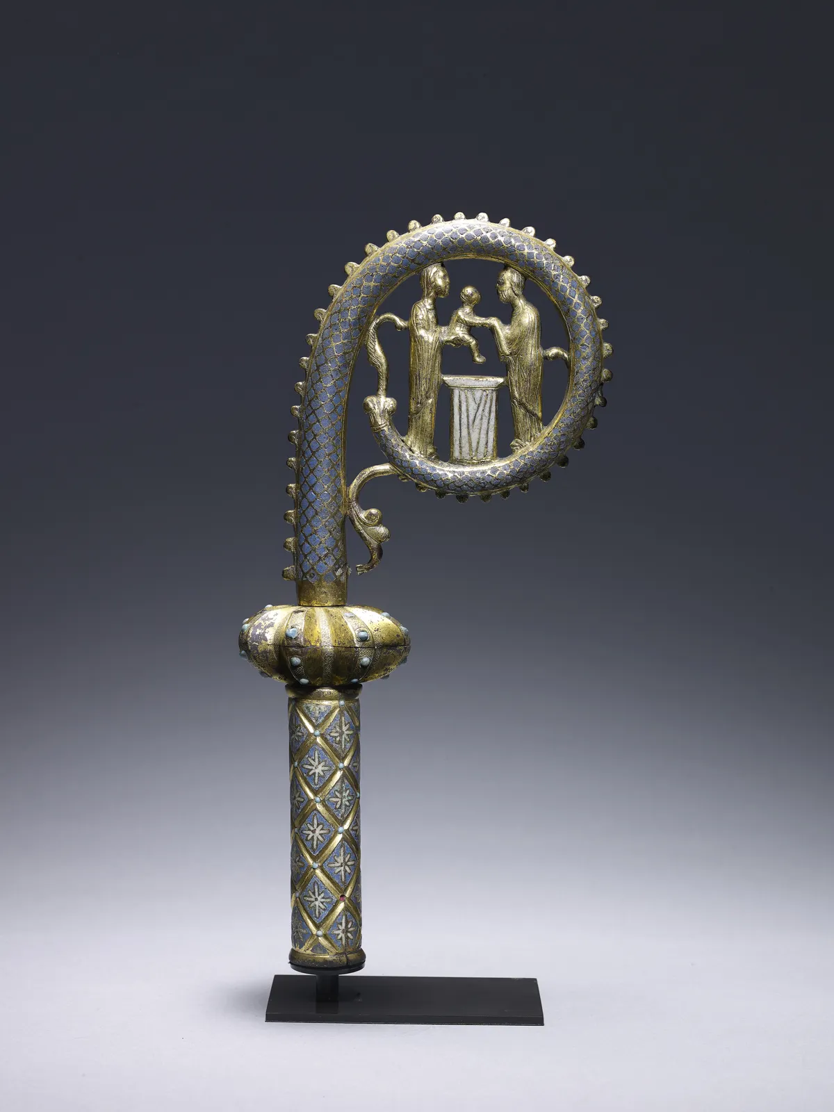 Crozier with the Presentation in the Temple, France (Limoges), c.1230-40, champlevé enamel on copper, gilded; h. 30 cm x w. 12.5 cm