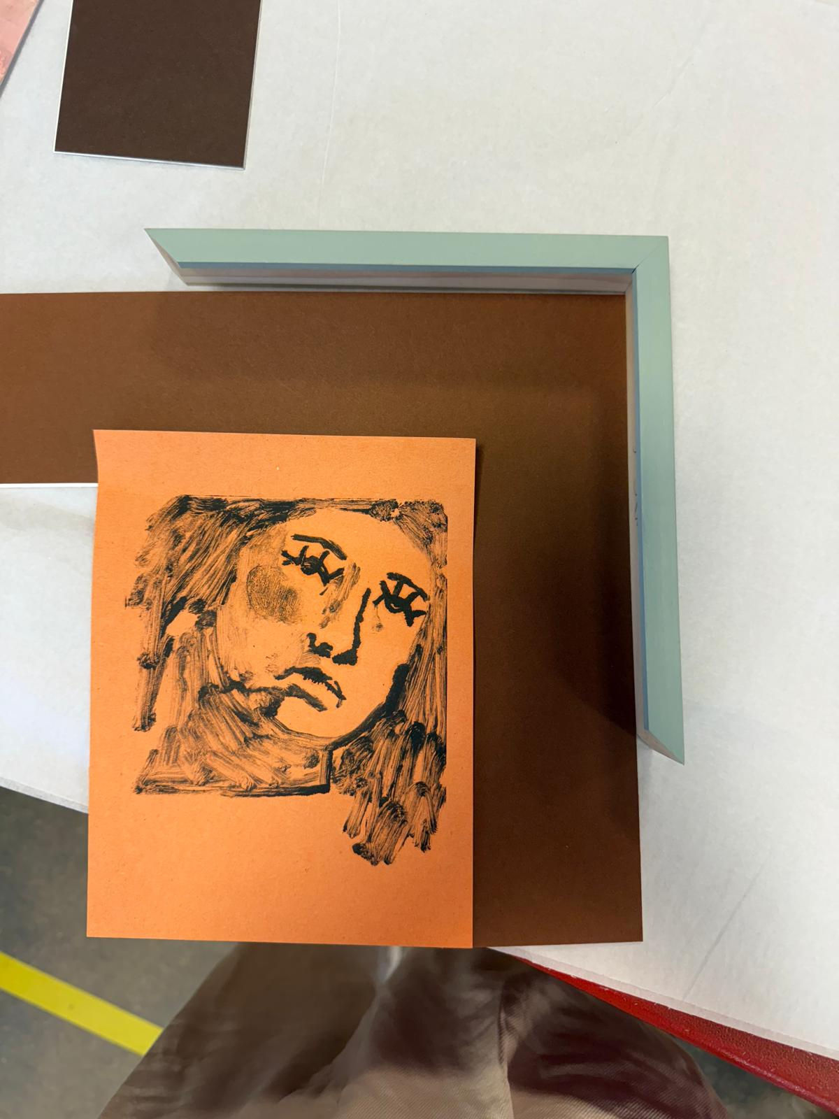 Abi Birkinshaw. Brown mount board with blue painted wood.