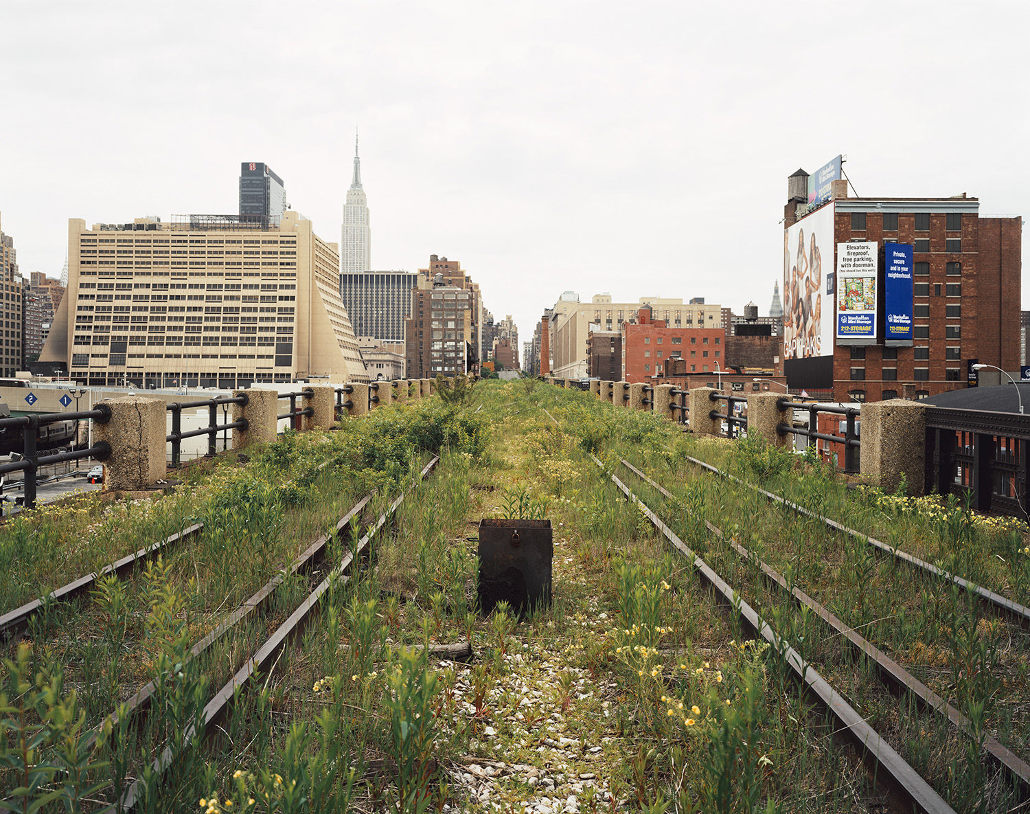 Joel Sternfeld, A Railroad Artifact, 30th Street, May 2000, 2000