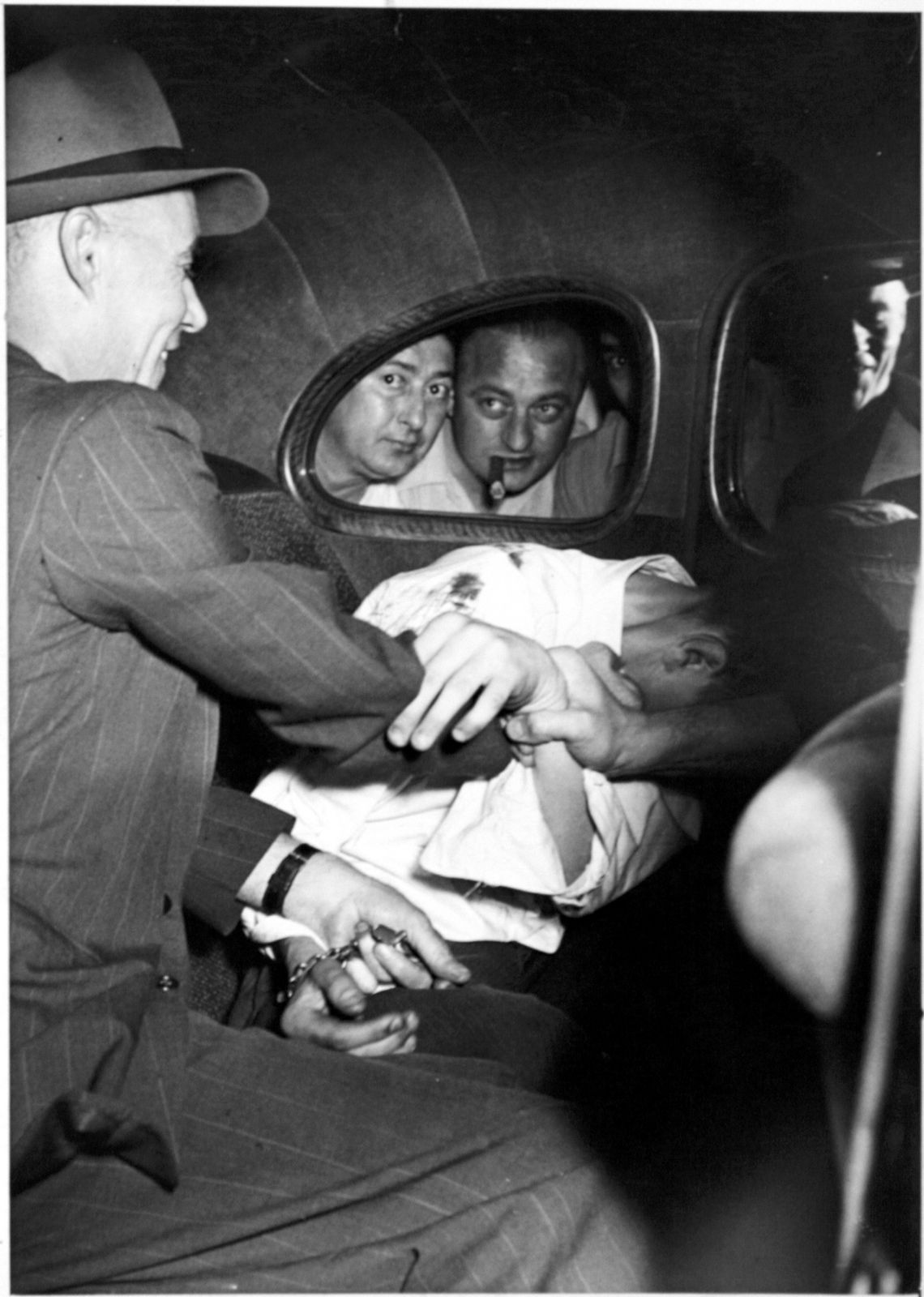 Weegee, Harold Horn knocked over milk wagon with stolen car, 1941 ca.