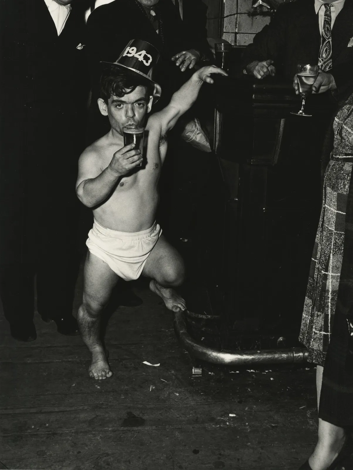 Weegee, New Year's Eve at Sammy's in the Bowery. Shorty, the Bowery Cherub, 1943