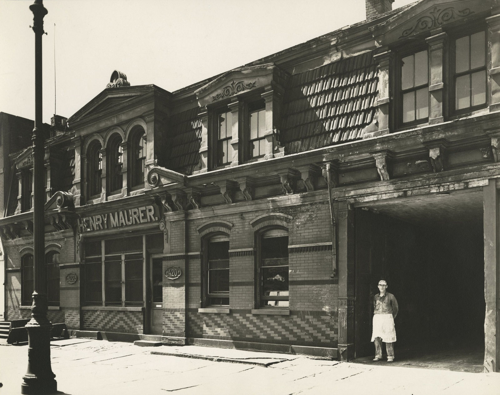 Berenice Abbott, Henry Maurer, 420-422 East 23rd Street, looking southeast, Manhattan, 1938