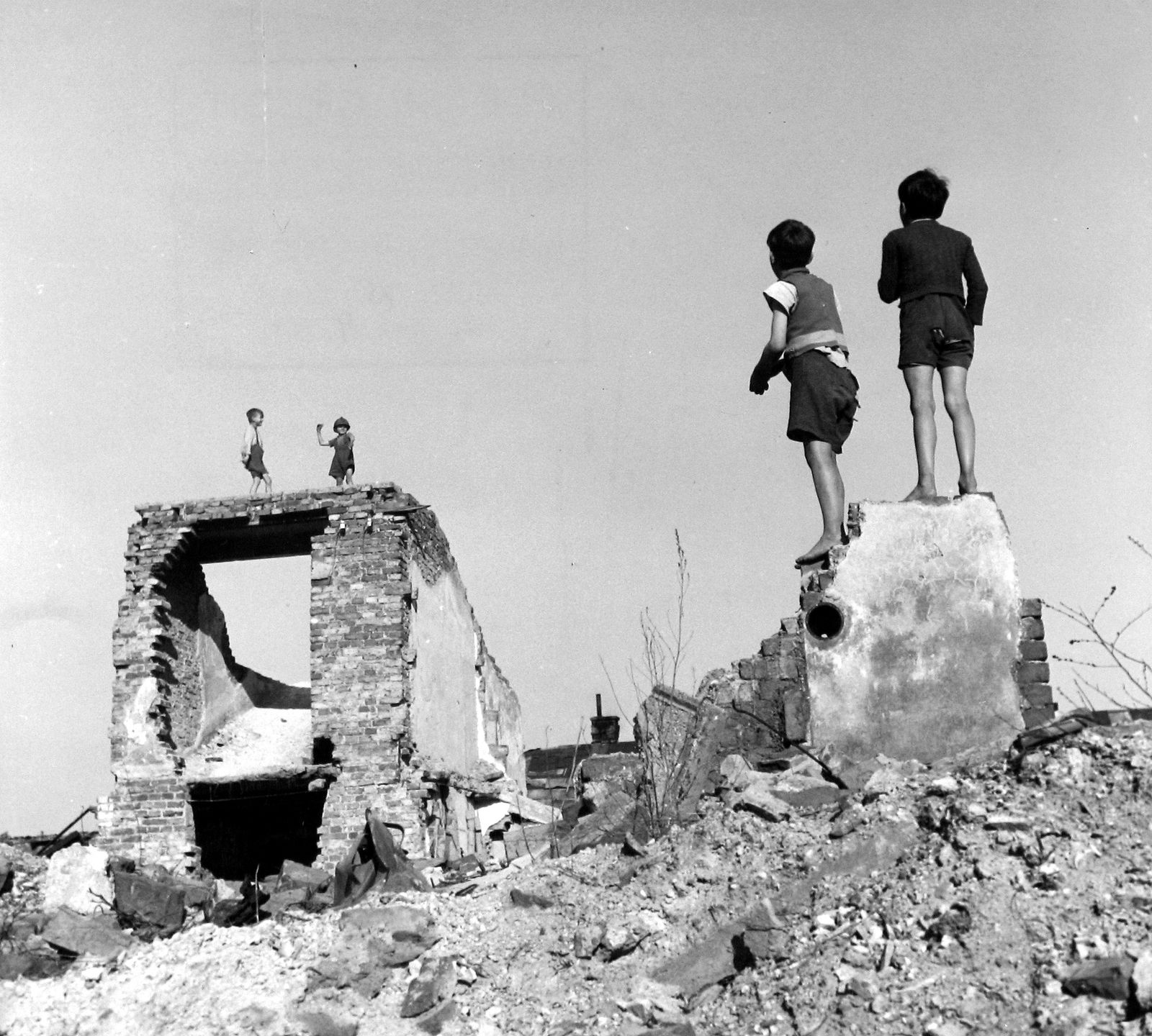 David Seymour, Boys Playing in Bombed-out Building, Vienna, 1948