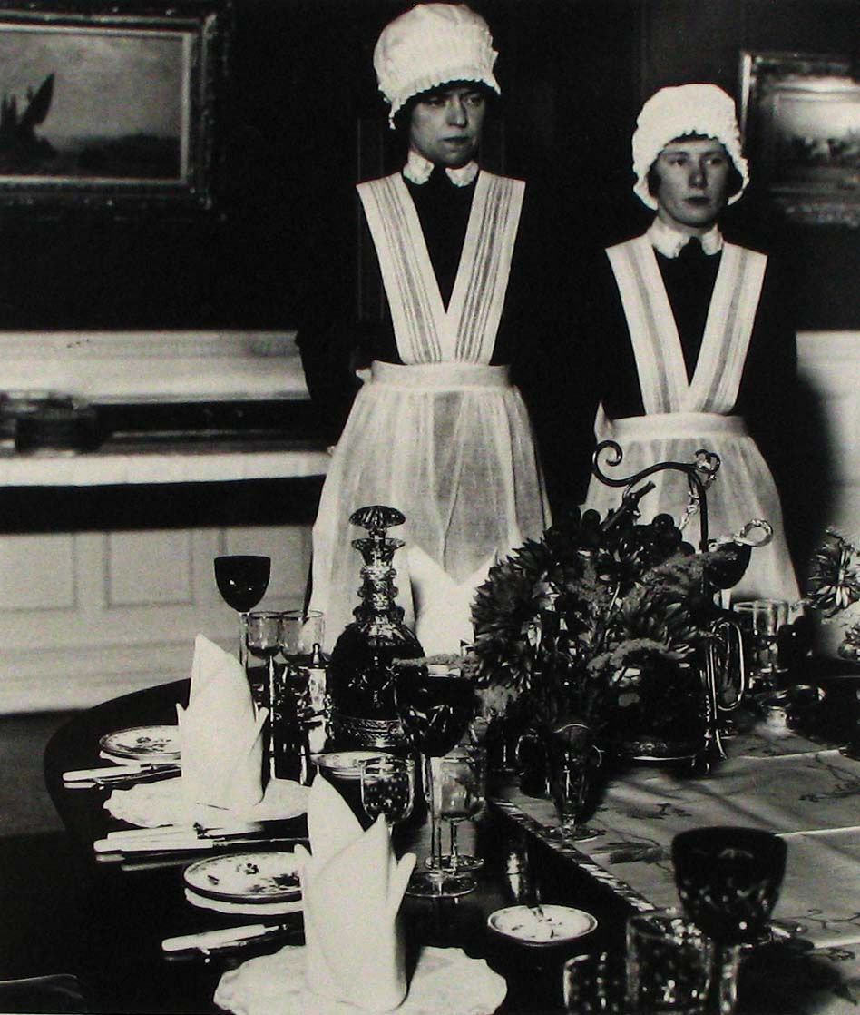 Bill Brandt, Parlourmaid and Underparlourmaid ready to serve dinner, 1936