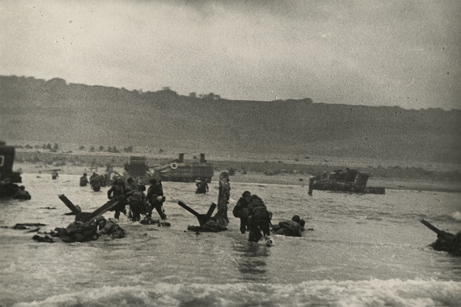 Robert Capa, American soldiers landing on Omaha Beach, D-Day, Normandy, France, June 6, 1944