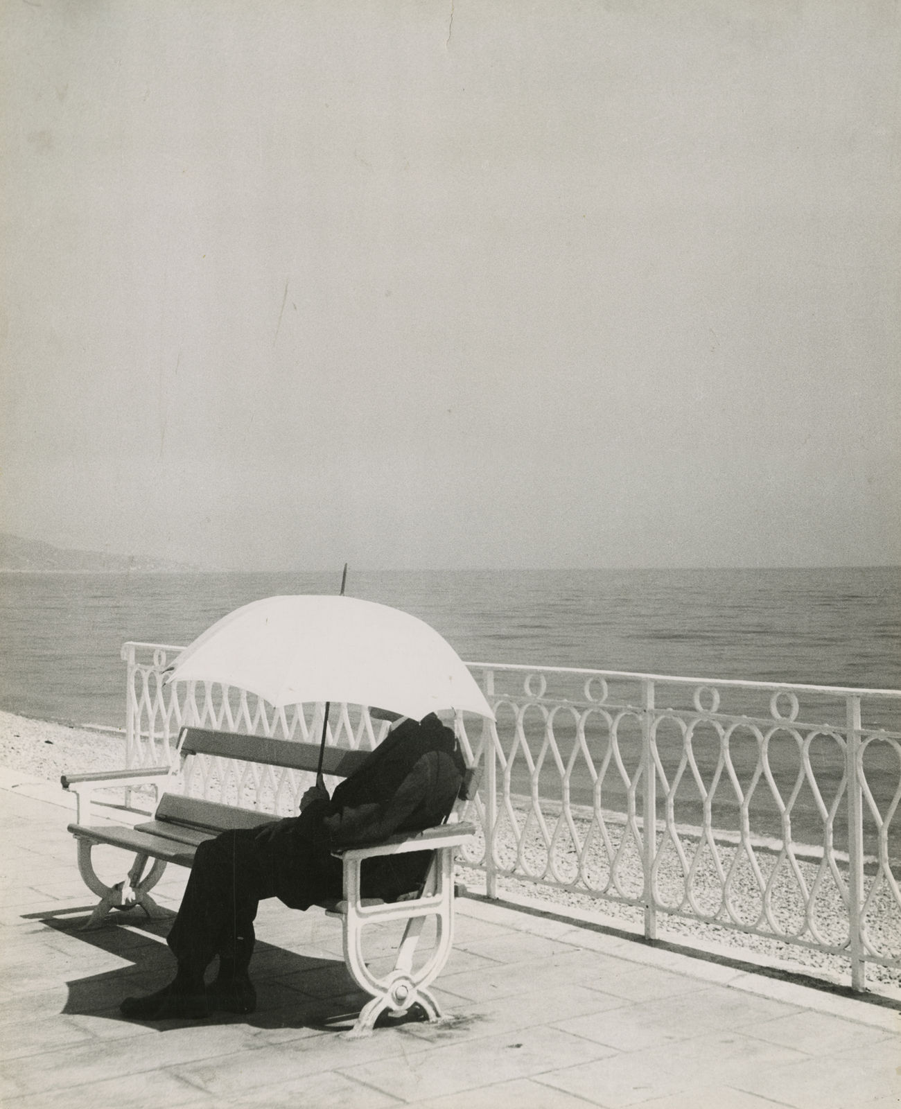 Brassaï, The Man With White Umbrella, 1934