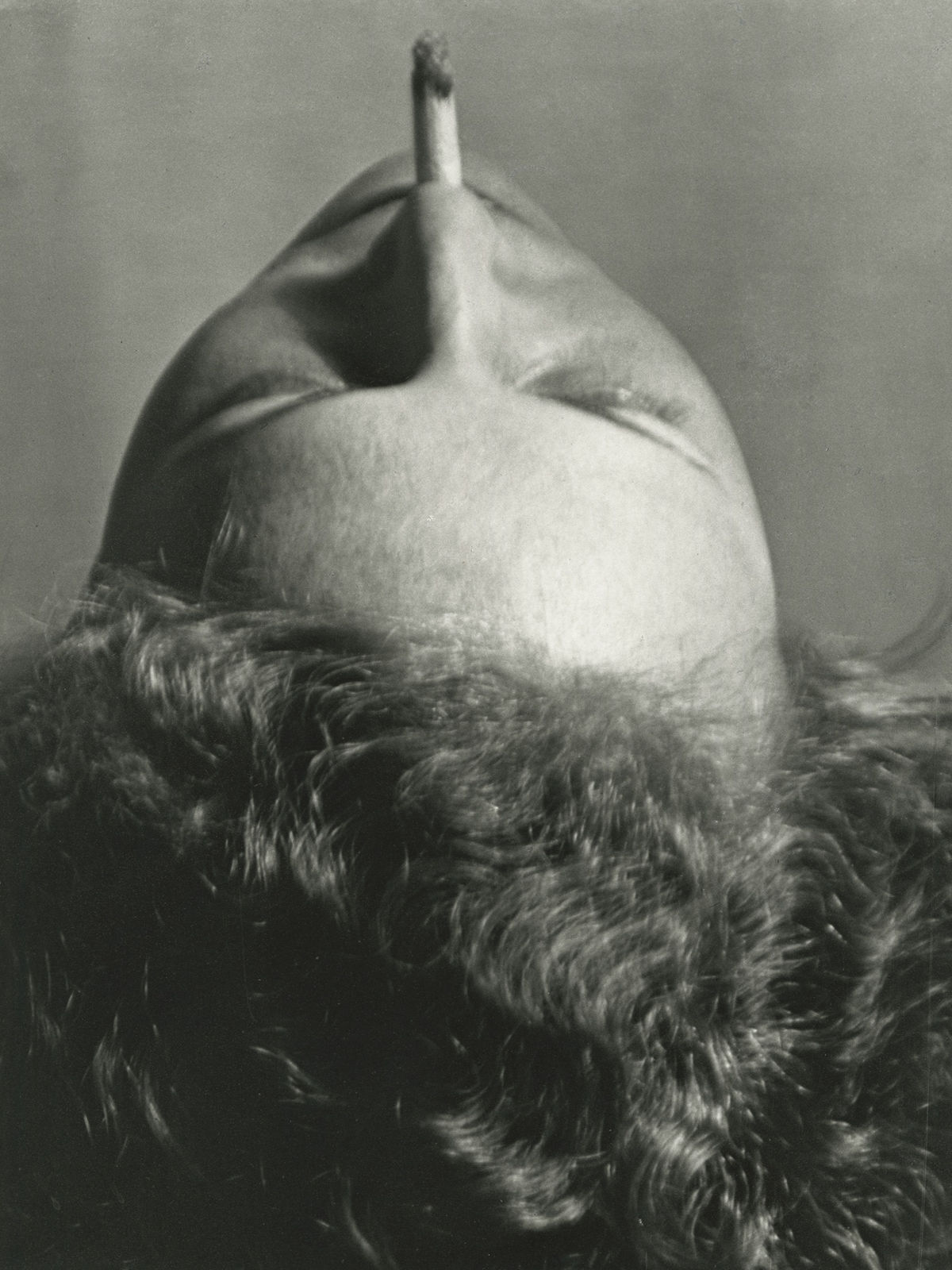 Man Ray, Woman Smoking a Cigarette, 1920