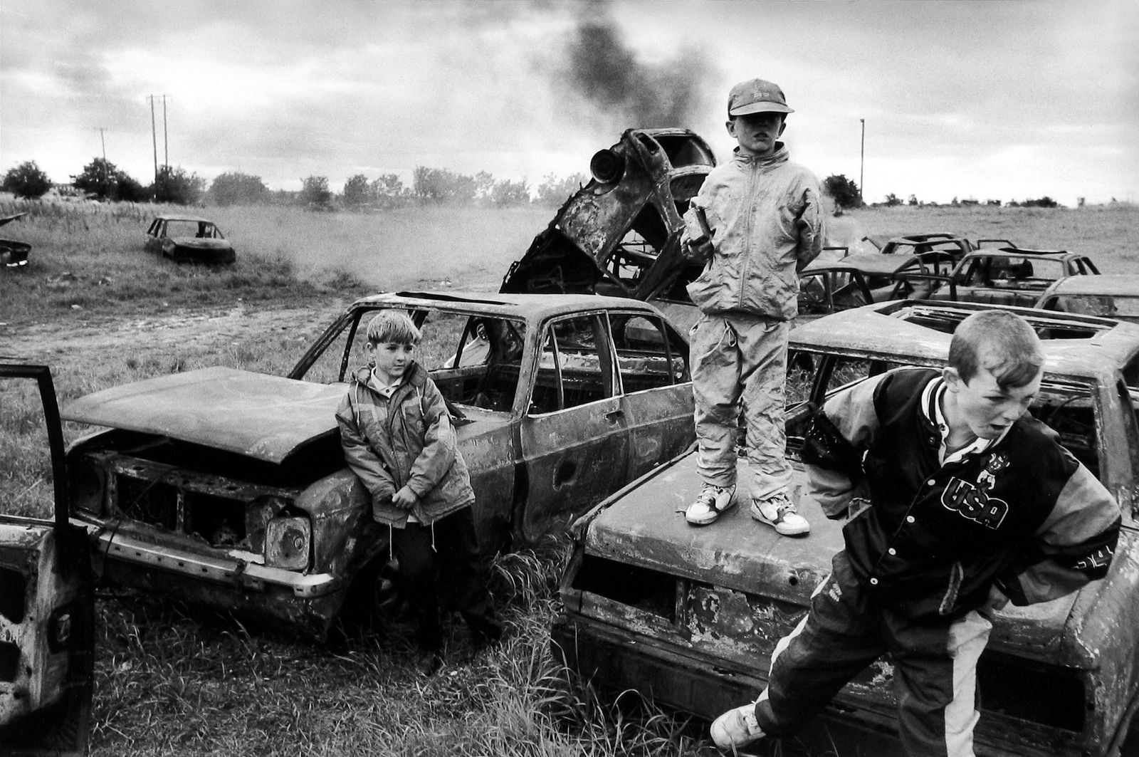 Martine Franck, Graveyard for stolen cars, Darndale, Ireland,, 1993