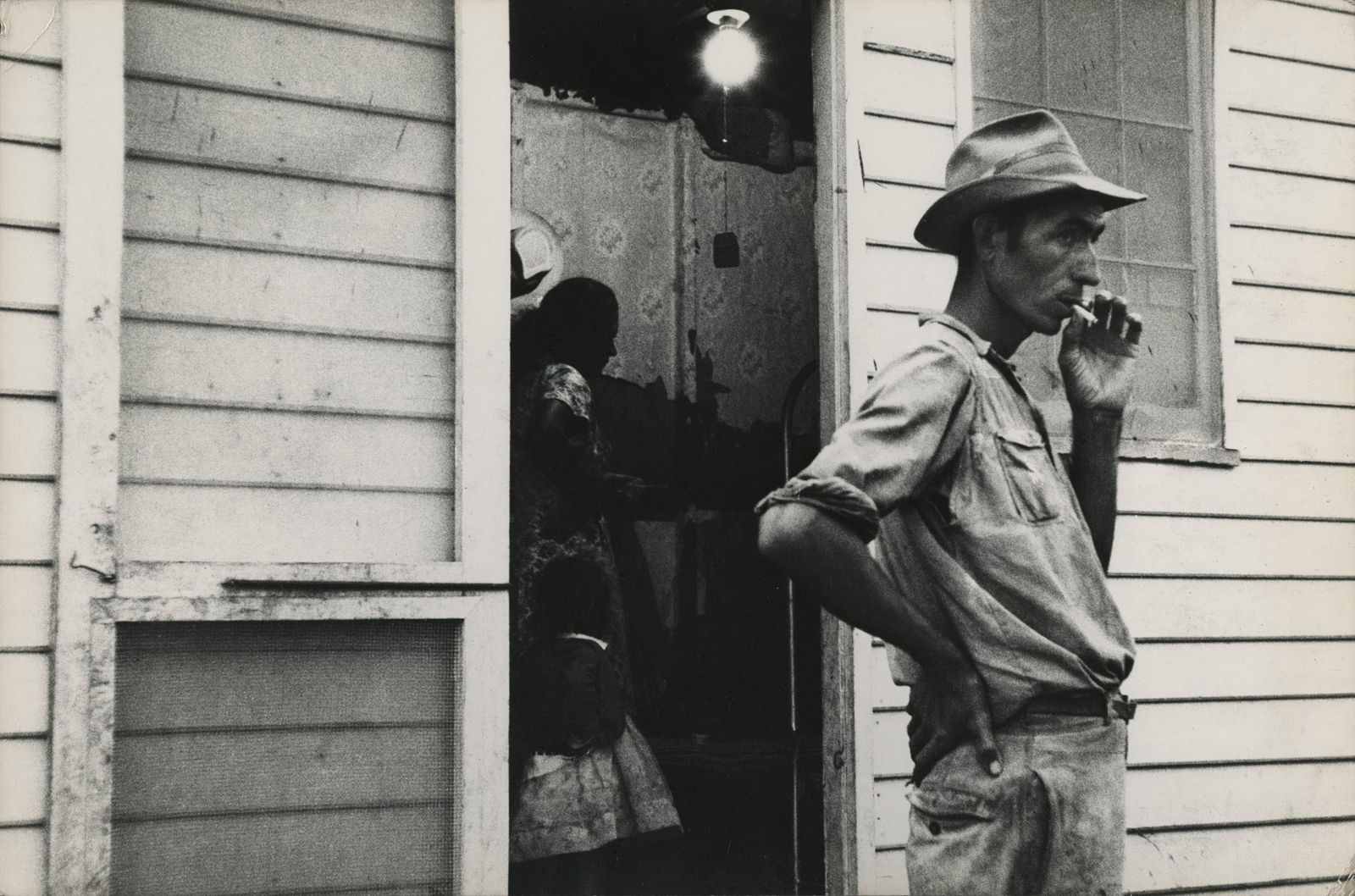 Charles Harbutt, Man & House, Glassboro, NJ, 1957