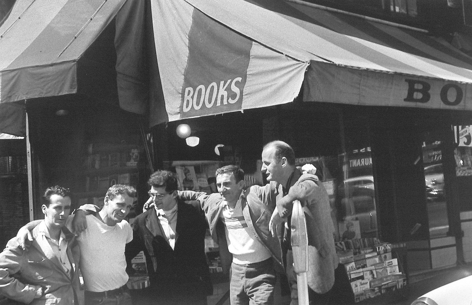 Allen Ginsberg, Bob Donlin, Neal Cassady, Allen Ginsberg, Robert La Vigne and Lawrence Ferlinghetti in front of City Lights Bookshop, San Francisco, 1955